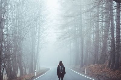 man hiking on road